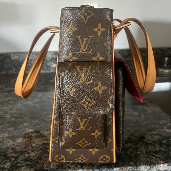 Louis Vuitton Multiplicite. Guaranteed authentic. - Picture 10 of 14
